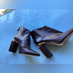 Zara  bootie with black and gold heel